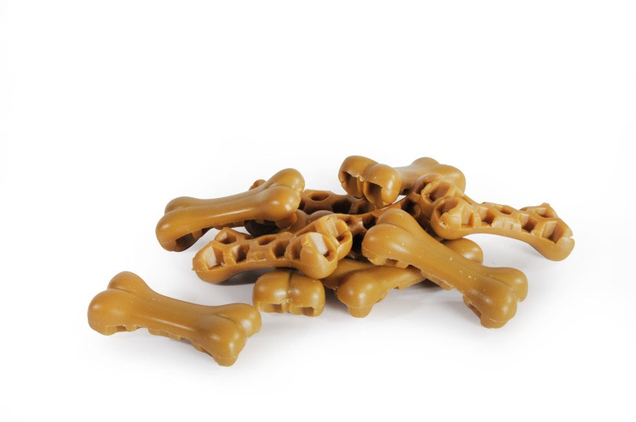 Snack ossetti Camon latte e miele per cani adulti, forma masticabile con alveoli, formato medio Snack ossetti Camon latte e miele per cani adulti, forma masticabile con alveoli, formato medio